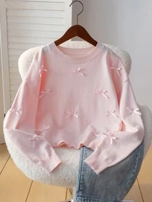 SHEIN 8-12歲女孩淺粉色圓領寬鬆落肩短版針織毛衣，滿版3D緞面蝴蝶結裝飾長袖套頭上衣，柔軟甜美，適合校園、外出、拍照，春秋穿著 - 粉色 - 查看 1