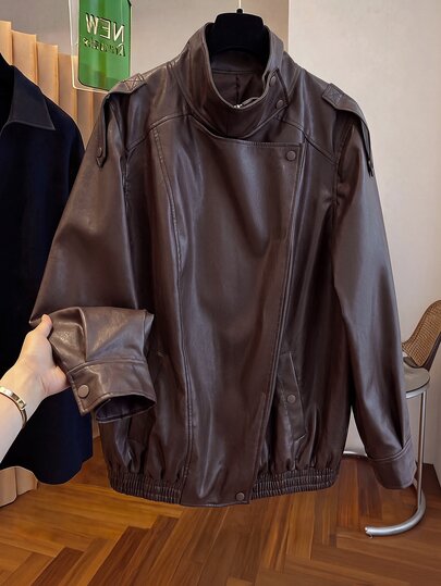 Chikora Women's Plus-Size Winter Jacket: Elegant PU Leather, Stand Collar, Pockets, Stylish & Edgy-Versatile For Everyday Wear And Outings.