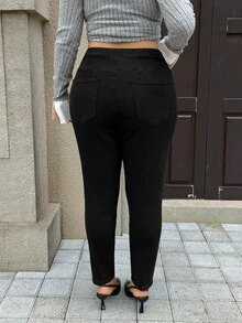 Rivivi Plus Size Women's Fitted Elastic Decorative Button Slim Long Pants - Black - View 2