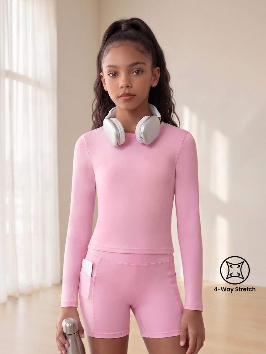 SHEIN Tween Girls Solid Color Sports Outfit, Sports Top + Sports Shorts Set, Comfortable And Fitted Fabric, Suitable For Outdoor Casual Activities - Pink - View 1