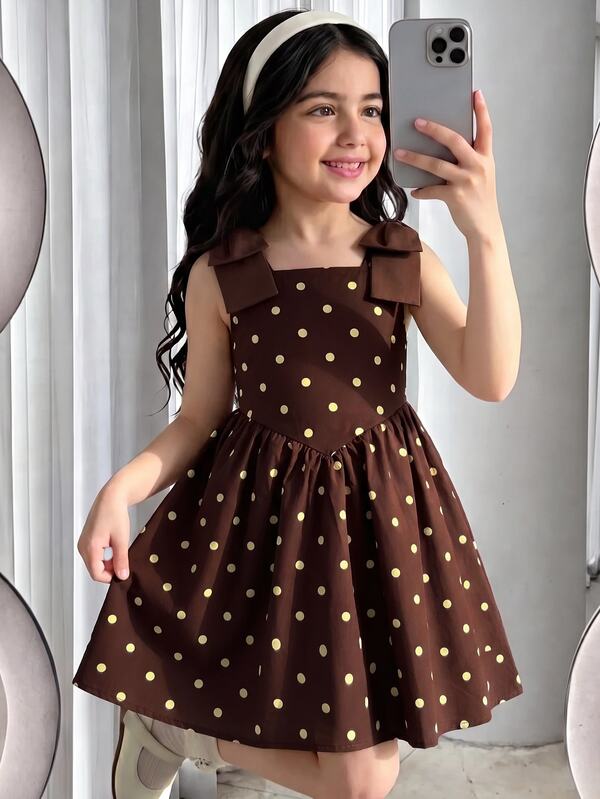SHEIN Young Girl 3D Jacquard Cami Dress, Textured Floral Fabric, Square Neckline, 3D Floral Wide Straps With Bow Decor, Cinched Waist, Full Skirt, Soft & Crisp, Suitable For Multiple Seasons, Fresh Cream Yellow Color, Exquisite Jacquard, Loose Fit, Easy To Style And Care For, Suitable For Daily Wear And Party Occasions, Young GirlS