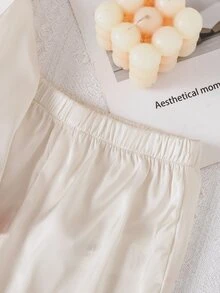SHEIN 女嬰秋冬緞面杏色與粉色拼接甜美極簡刺繡圖案翻領鈕扣式荷葉邊長袖長褲舒適親膚針織睡衣套裝 2件組 - 杏色 - 查看 7