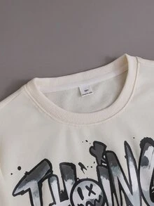 SHEIN Genkimix Kids 2件組青少年男孩時尚白色運動衫與深綠色長褲套裝，胸前綠色圖案印花，時尚街頭風，柔軟舒適面料，易穿脫，適合春秋季節，完美適用於學校、外出及各種場合，青少年男孩必備兩件套 - 黑色 - 查看 4