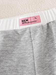 SHEIN 女童學院風 Polo 領兩件套，海軍藍對比翻領長袖上衣 + 高腰寬腿褲，經典馬術刺繡休閒套裝，百搭運動風，適合春/秋季校園與日常穿著 - 淺灰色 - 查看 4