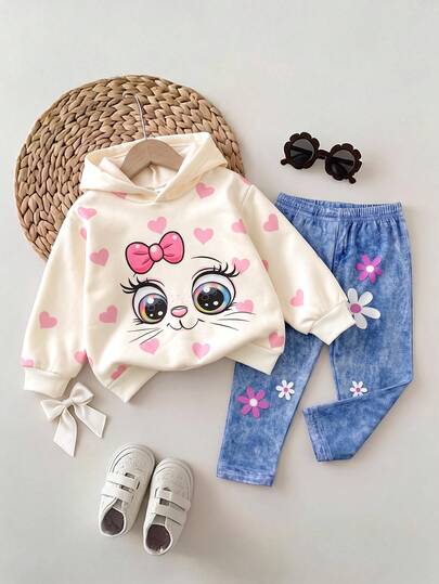 SHEIN Setelan Baju Anak Perempuan 2 Potong: Hoodie Motif Kartun Kucing Mata Besar dan Hati + Celana Jeans Denim Motif Bunga