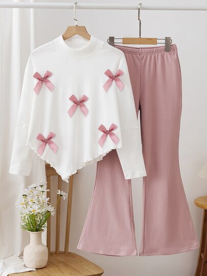 Girls (Big) Bowknot Long Sleeve 2 Pieces Set, Top With Semi-High Neck And Asymmetrical Hem Design, Edged With Wavy Ruffle Trim, Body Decorated With Pink Satin Bows, Bottom Paired With Pink Flared Pants, Overall White + Pink Soft Color Palette, Suitable For Daily School, Park Outings, Shopping, And Small Gatherings