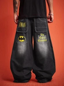ROMWE MEN Batman X ROMWE بنطلون جينز رجالي بقصة فضفاضة وطبعة تعاونية - الأسود - مشاهدة 1