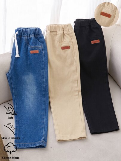 Ensemble 3 pièces de pantalons longs en denim pour jeune garçon, style de rue décontracté, design de vacances polyvalent bleu moyen + kaki + noir, pantalon long en denim basique minimaliste avec ceinture élastique complète et corde décorative blanche, tissu en denim de coton confortable sans étirement pour le port quotidien, les fêtes, l'école, la maison, les déplacements, nouvelle arrivée automne 2026