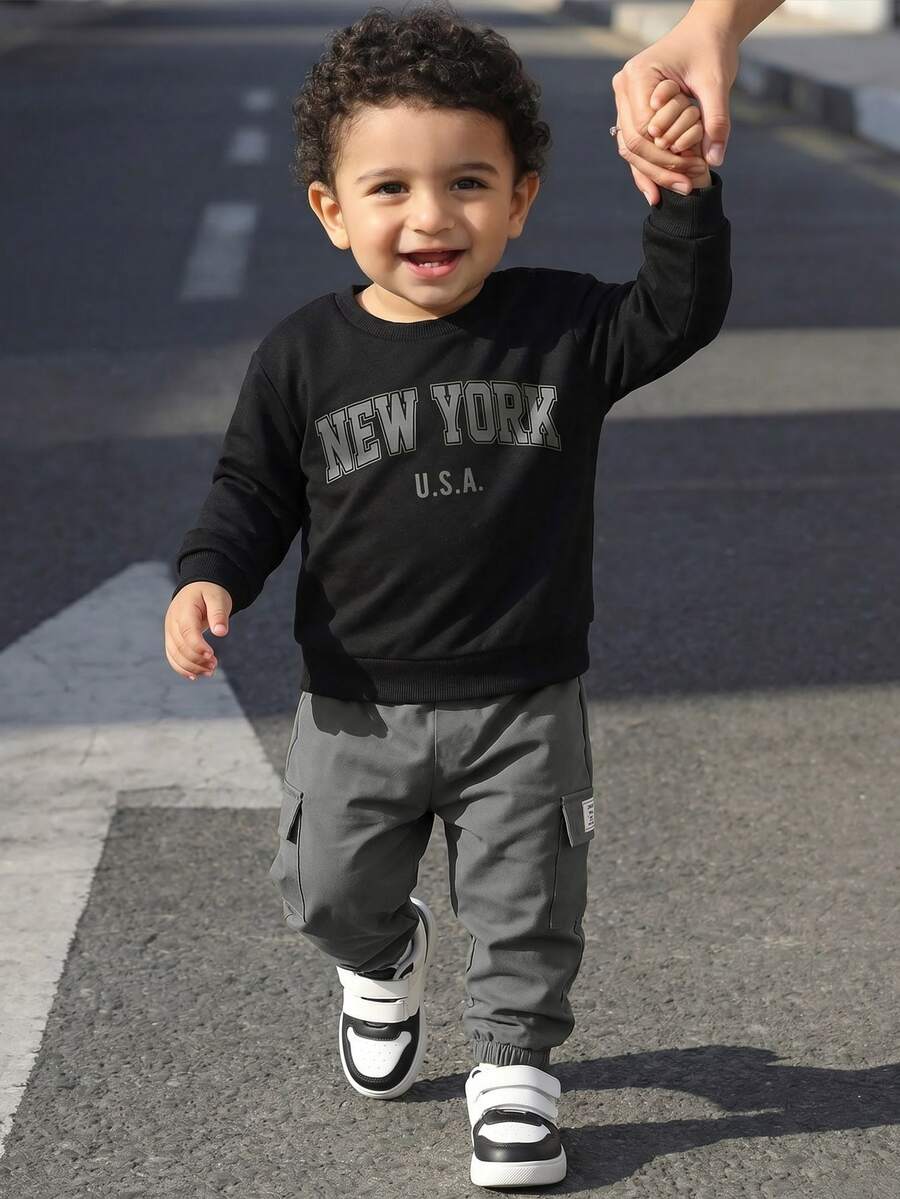 SHEIN 2pcs/Set Baby Boy Minimalist Casual Autumn New English Letter Graphic Long Sleeve Sweatshirt & Elastic Waist Long Pants Outfit, Suitable For Street Style, Daily Wear, Vacation, Easy Comfort, Layers For Kids, Stylish Kids, Casual Wear, Kids Sports College Number Graphic T-Shirts, Back To School, Homecoming - Grey - View 1
