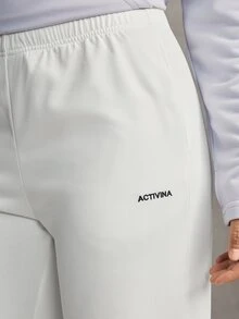 Activina Women's Summer Spring Elegant Stylish White Wide Leg Sports Pants With Elastic Waistband And Pockets Design With Logo Detail - White - View 6