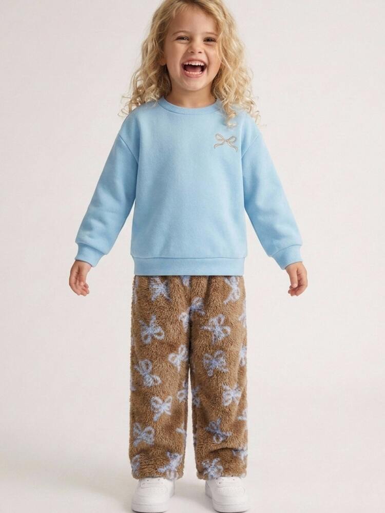 Maija Kids Maija Kids طقم من قطعتين للفتيات الصغيرات، سويتشيرت أزرق أنيق وكاجوال مريح متعدد الاستخدامات بطبعة فيونكة لطيفة وياقة دائرية وأكمام طويلة، وبنطلون طويل بني فروي بطبعة فيونكة زرقاء وخصر مطاطي، مناسب للعودة إلى المدرسة والخروجات والأنشطة الكاجوال والتجمعات، مناسب لفصلي الخريف والشتاء - متعدد الألوان - مشاهدة 8
