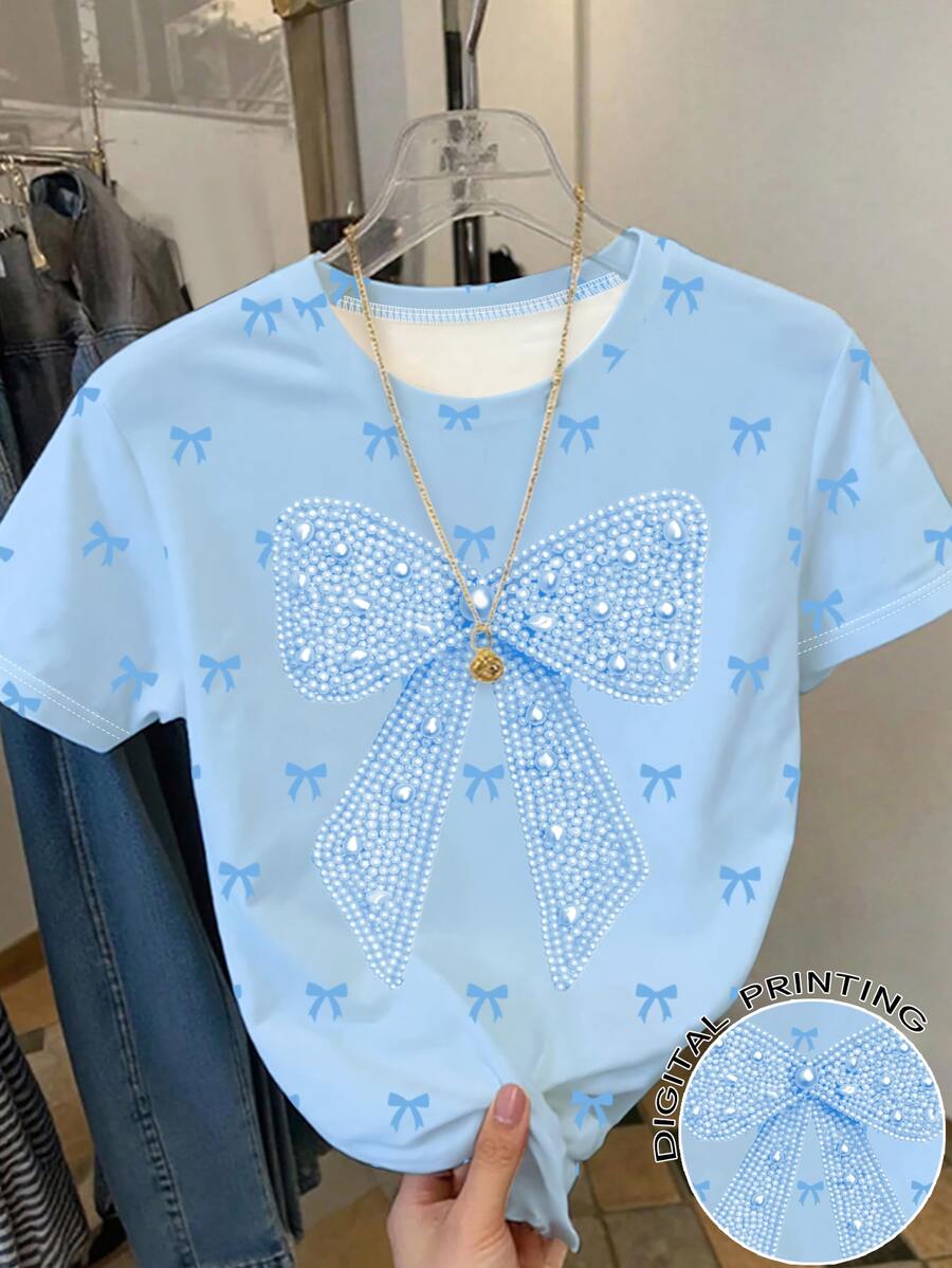 1件少女夏季休閒T恤,仿珍珠大蝴蝶結圖案滿版印花迷你蝴蝶結圓領短袖上衣 - 彩色 - 查看 1