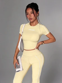 Dewbera Dewbera 女款粉色緊身短袖圓領運動T恤與喇叭褲戶外健身套裝 - 淡黃色 - 查看 4