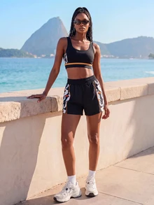 CAJUNI Black Gym Shorts Featuring A Toucan Print On The Sides And Orange Binding Detail- Activewear. - Black and White - View 8