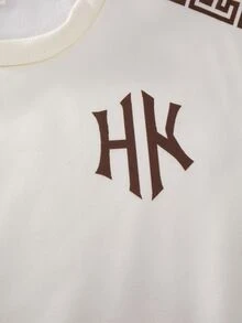 SHEIN 2件組時尚白色運動衫與深綠色長褲套裝，胸前綠色圖案印花，時尚街頭風，柔軟舒適面料，易穿搭，適合春季與秋季，適用於學校、外出，青少年男孩必備穿搭 - 杏色 - 查看 4