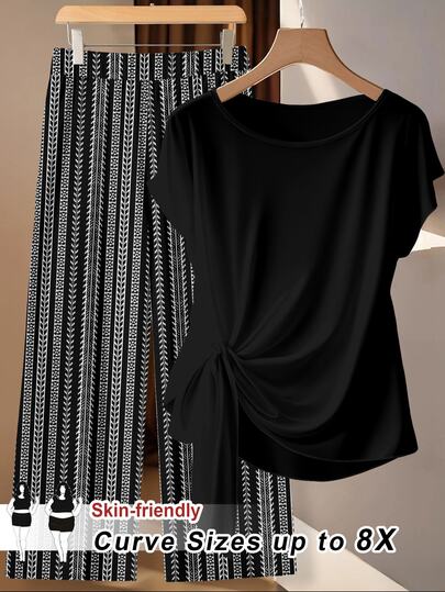SHEIN CURVE+ مجموعة من قطعتين للنساء بمقاسات كبيرة، ملابس علوية أسود كاجوال بأكمام قصيرة وبنطلون طويل بطبعة زهور عتيقة وخطوط، مناسبة لعطلة الصيف