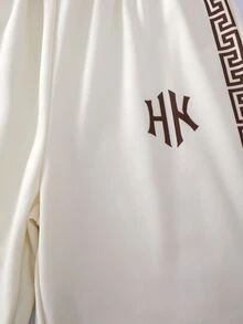 SHEIN 2件組時尚白色運動衫與深綠色長褲套裝，胸前綠色圖案印花，時尚街頭風，柔軟舒適面料，易穿搭，適合春季與秋季，適用於學校、外出，青少年男孩必備穿搭 - 杏色 - 查看 5