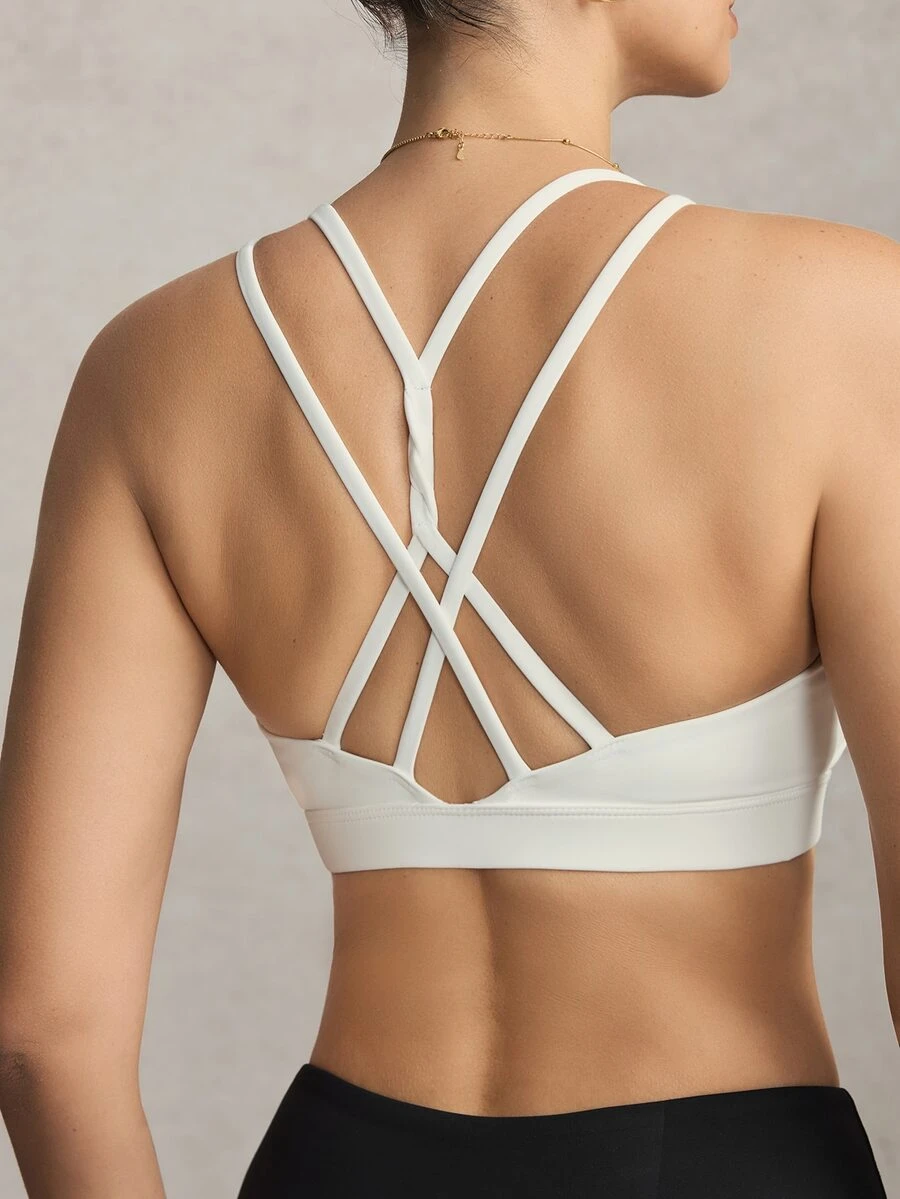 Activina Women's Solid Color Criss-Cross Back Everyday Fitness Sports Bra - White - View 1