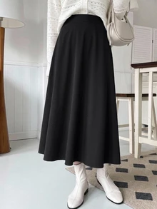 DAZY 秋冬高腰 A 字裙 素色梭織布料 極簡通勤風 女款中長裙 - 黑色 - 查看 1