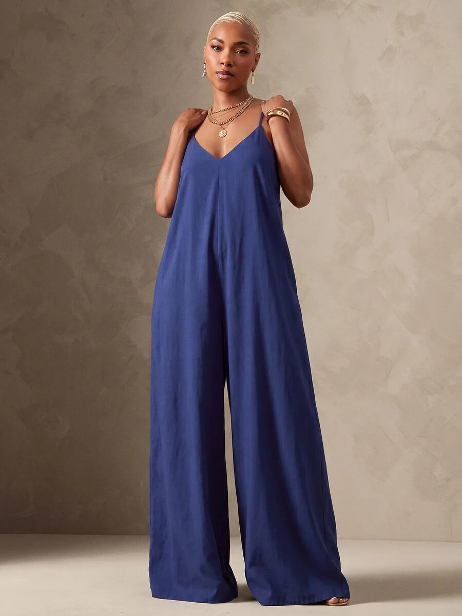 Vixey Jumpsuit longgar dengan motif geometris, leher V, tali cami yang dapat disesuaikan, dan potongan kaki ultra lebar. - Navy Blue - View 1