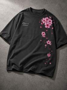 Manfinity EMRG 男士寬鬆櫻花與字母圖案印花短袖T恤，黑色日系街頭風 - 黑色 - 查看 1