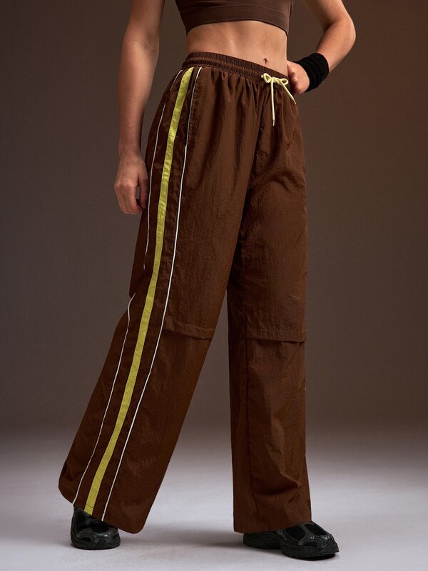 Powerista Women's All Seasons Sports Pants Brown Wide Leg Sports Pants With Yellow Side Stripe Drawstring Waist Casual Athletic Trousers Uses Breathable Fabric