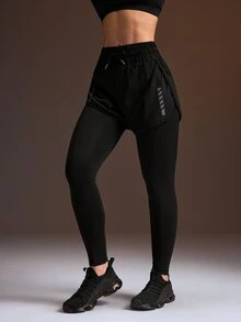Powerista Women's All Seasons Black 2-In-1 Running Shorts With Phone Pocket Athletic Leggings Features Breathable Fabric And Reflective Patterns - Black - View 1