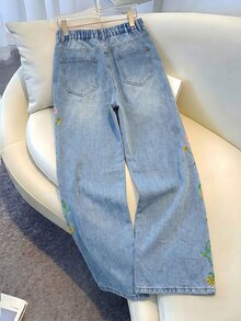 GlowEve CURVE Plus Size Women's Casual Daily Denim Jeans With Pockets, Buttons And Floral Embroidery Pattern - Blue - View 2