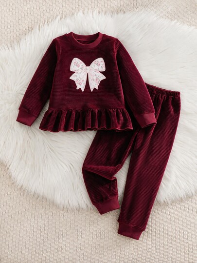 SHEIN Girls' Burgundy Striped Plush 2-Piece Loungewear Set, Round Neck Long Sleeve Top With Bow Embroidery And Ruffle Hem, Matching Loose Cuffed Pants In Soft Skin-Friendly Fleece, Sweet And Cozy Autumn/Winter Pajama Set