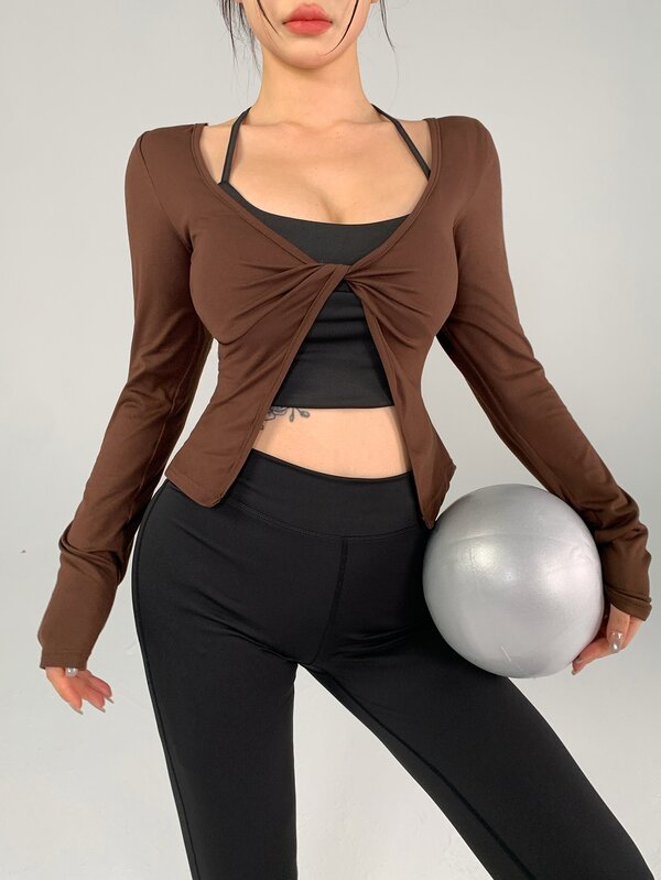 DAZY Camiseta deportiva casual de fitness para mujer de color liso con nudo delantero y bajo con abertura