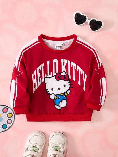 HELLO KITTY AND FRIENDS | SHEIN بلوزة رياضية كاجوال للبنات الصغيرات بطبعة خطوط وحروف، بياقة دائرية وأكمام طويلة