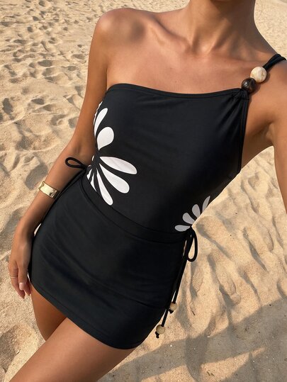 Swim Oasis Traje de baño de una pieza con un solo hombro, estampado negro con cuentas, para vacaciones de primavera/verano, con falda a juego para mujer
