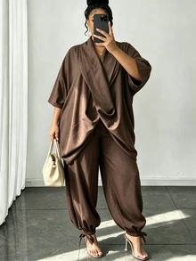 Lacomfia Bộ 2 món thời trang size lớn dáng rộng, áo top thiết kế bất đối xứng màu nâu vải cotton linen kèm quần cà rốt gấu bo - màu nâu - Xem 5