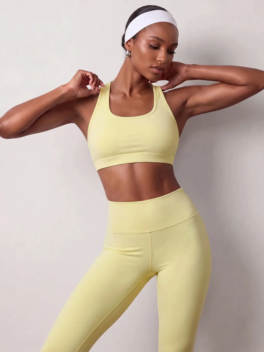 Zivah Women's Solid Color Cropped Halter Tank Top And Leggings Sports Set - Yellow - View 1