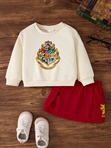 HARRY POTTER X SHEIN طقم بلوزة رياضية بأكمام طويلة مطبوعة برسومات كرتونية وتنورة كارغو للبنات الصغيرات - متعدد الألوان - مشاهدة 1