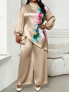 SHEIN Lady CURVE طقم من قطعتين مقاس كبير من الساتان بطبعة زهور مع ملابس علوية بحافة غير متماثلة وبنطال طويل فضفاض للخريف - الذهبي - مشاهدة 3