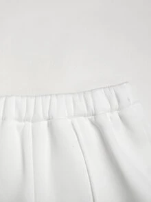 SHEIN Tween女孩秋冬休閒街頭風保暖內裡加厚運動衫套裝，迷彩字母印花寬鬆圓領落肩長袖套頭衫，搭配同款印花齒褶寬腿直筒運動長褲，白色運動套裝2件組，學院風編號80，迷彩乾葉印花，美式校園風，Citywalk - 白色 - 查看 7