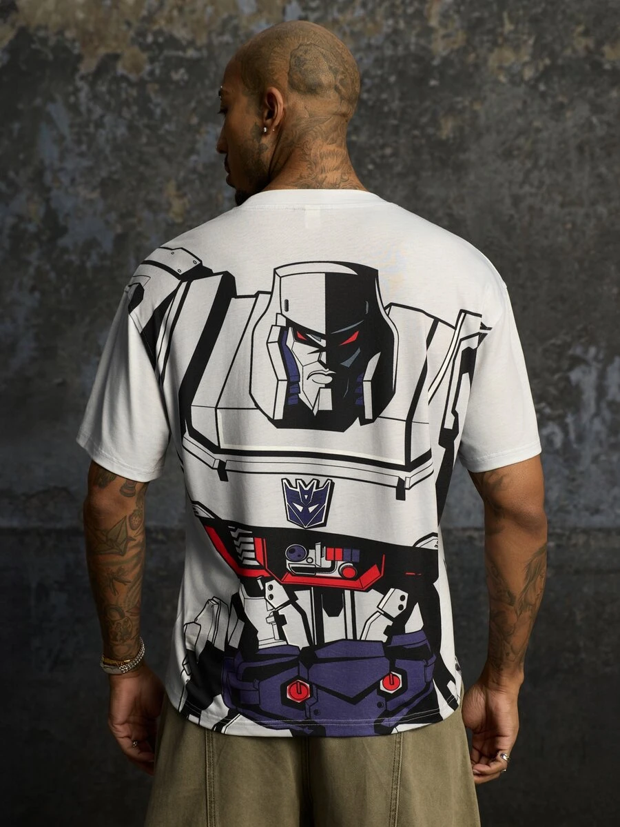 Transformers X SHEIN تي شيرت كاجوال رجالي بياقة دائرية وأكمام قصيرة بلون أخضر داكن - رمادي - مشاهدة 1