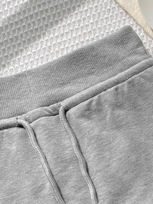 SHEIN تنورة رياضية كاجوال للبنات المراهقات مع حبل شد، محبوكة بلون رمادي فاتح سادة، مع ليقنز مدمج - رمادي فاتح - مشاهدة 5