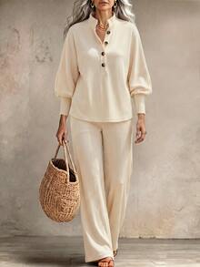 Zayélia Off-White Ribbed Lounge Set. Button Split-Neck Top With Balloon Sleeves Matched With Relaxed Wide-Leg Trousers. - Multicolor - View 1