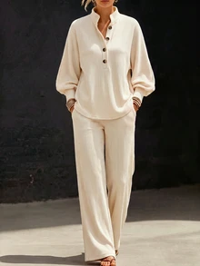 Zayélia Off-White Ribbed Lounge Set. Button Split-Neck Top With Balloon Sleeves Matched With Relaxed Wide-Leg Trousers. - Multicolor - View 5