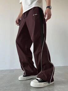 Manfinity EMRG 男士休閒拼色抽繩直筒長褲，寬鬆拼接黑色直筒運動長褲，適合戶外穿著 - 酒紅色 - 查看 1
