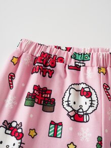 HELLO KITTY AND FRIENDS | SHEIN طقم ملابس منزلية للبنات الصغيرات بطبعة شجرة عيد الميلاد، ملابس علوية بأكمام قصيرة وبنطلون طويل - متعدد الألوان - مشاهدة 5