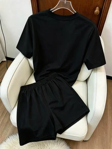 Resyla 女款 2 件組夏季休閒套裝，黑色 New York 字母印花圓領短袖 T 恤與 Brooklyn 印花長褲套裝，優雅舒適設計，適合日常穿著與運動 - 黑色 - 查看 2