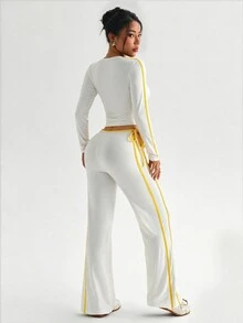StreetHx Women's Round Neck Long Sleeve T-Shirt And Side Waist Cutout Tie Flare Pants Sports Set - White - View 3