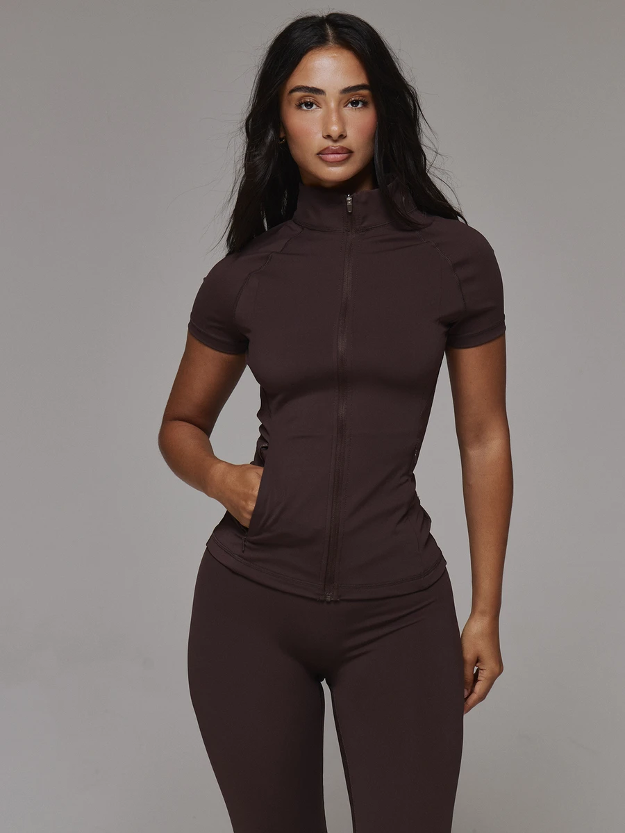 Musera Sport Zip Through High Neck Short Sleeve Logo Back Fitted BBL Active Jacket Sport Essentials Basics Gym Workout Autumn Fall Winter - Coffee Brown - View 1