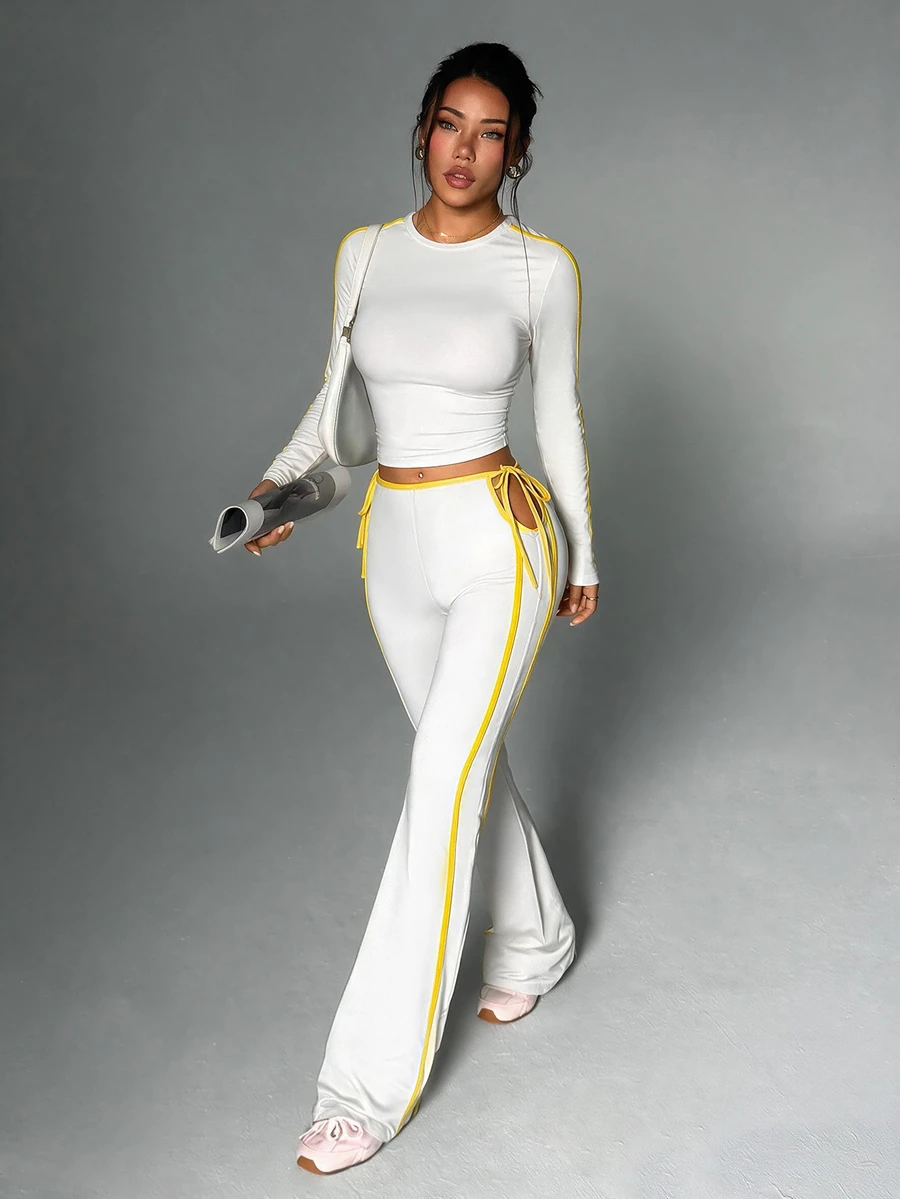 StreetHx Women's Round Neck Long Sleeve T-Shirt And Side Waist Cutout Tie Flare Pants Sports Set - White - View 1