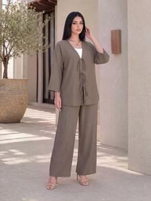 SHEIN Lady CURVE طقم نسائي مقاس كبير بلون موحد، توب بياقة V وأكمام 3/4 مع عقدة وبنطلون طويل فضفاض من قطعتين - كاكي - مشاهدة 3