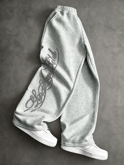 Manfinity Hypemode Men's Plus Size Sweatpants, Fashionable Handwritten English 3D Towel Embroidery Craft, Comfortable Sweatshirt Fabric, Crisp And Shaped, Loose Straight Leg Fit, Streetwear Versatile , Casual Comfortable Versatile, Suitable For Outings, Street Photography, Home, Travel, Vacation, Daily Wear, Men's Autumn/Winter Plus Size Sweatpants