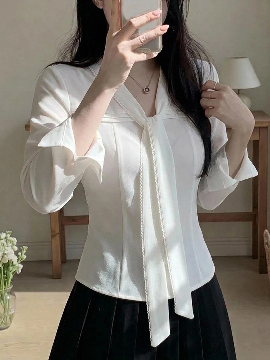 DAZY Women's Solid Color Long Sleeve Button-Up Fitted Tie-Front Blouse - White - View 1